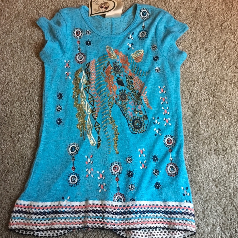 Girls tunic with a really cool horse